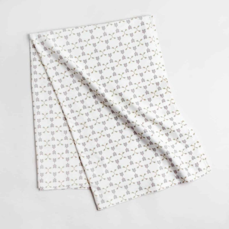 Luxury organic neutral cross stitch geometric pattern knit throw folded