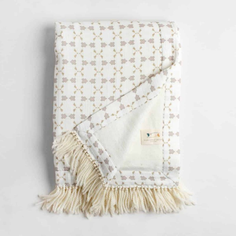 Luxury organic neutral cross stitch geometric pattern plush lined throw with hand knotted fringe folded over