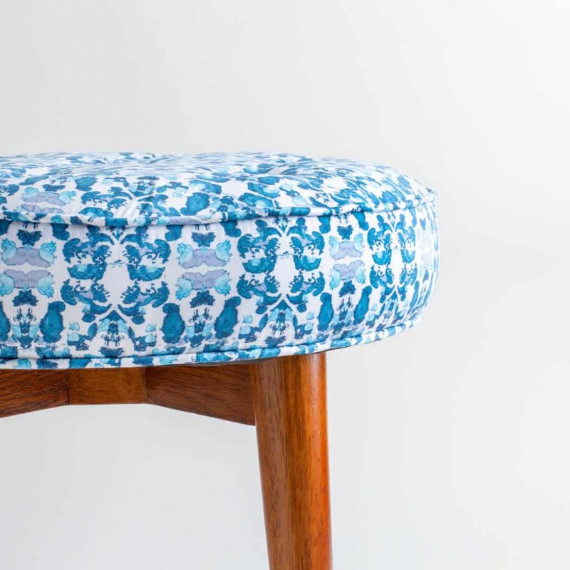 Luxury organic abstract tessellating floral teal upholstered stool close up