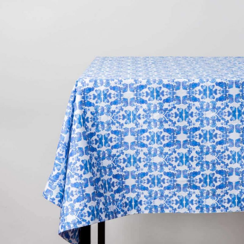 Luxury organic abstract tessellating floral blue tablecloth on table