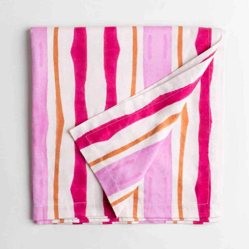 Luxury organic pink and orange mirrored watercolor stripe tablecloth folded