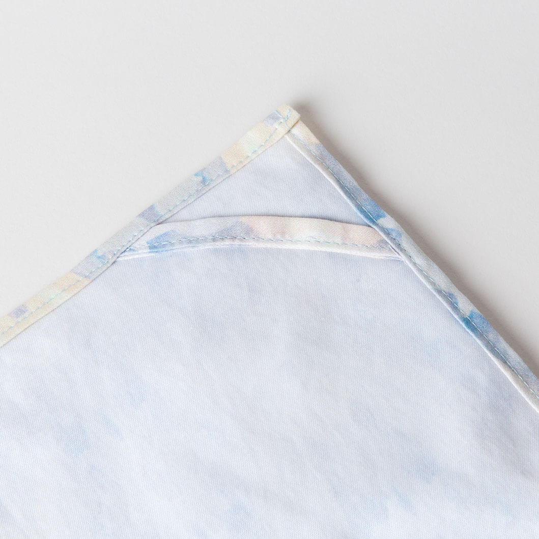 https://lindacabotdesign.com/wp-content/uploads/2018/10/Tea-towel-organic-cotton-artisan-handmade-luxury-diamond-light-blue-periwinkle-loop.jpg