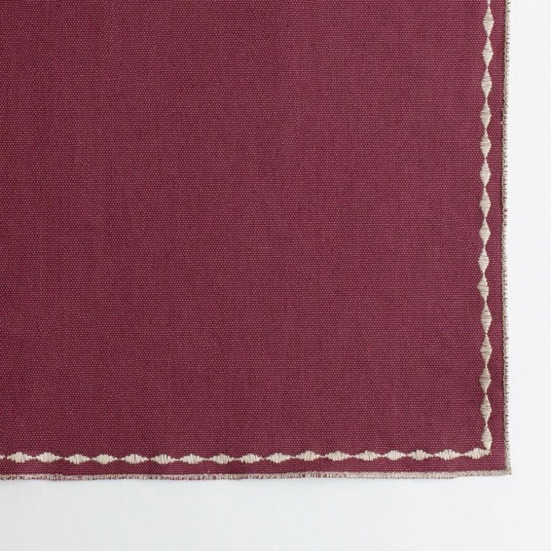 Merlot placemat with decorative stitching