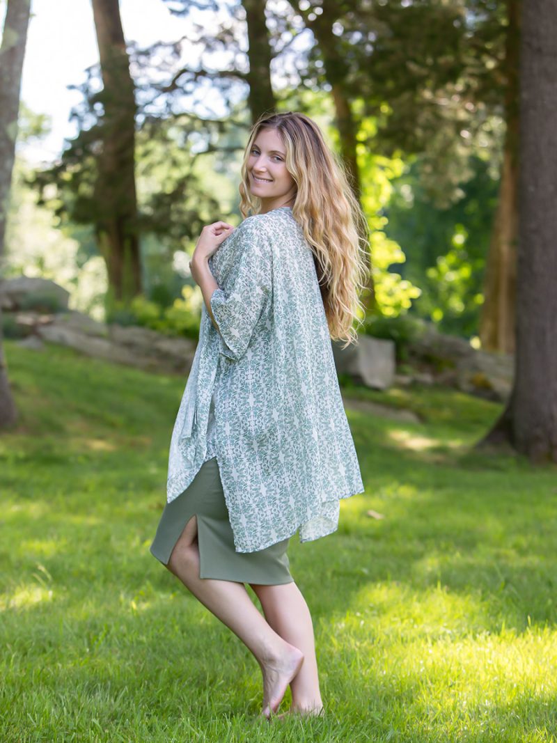 sustainable green and white cardigan