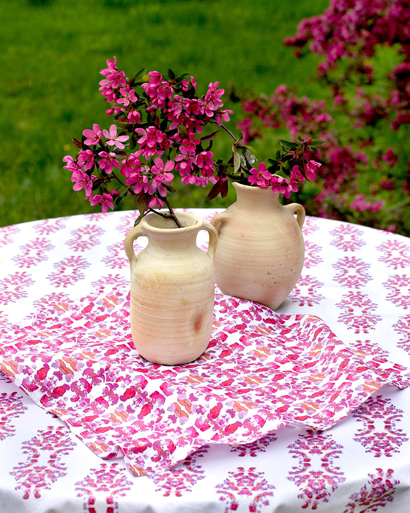 linda cabot design using a napkin under a potted plant or vase