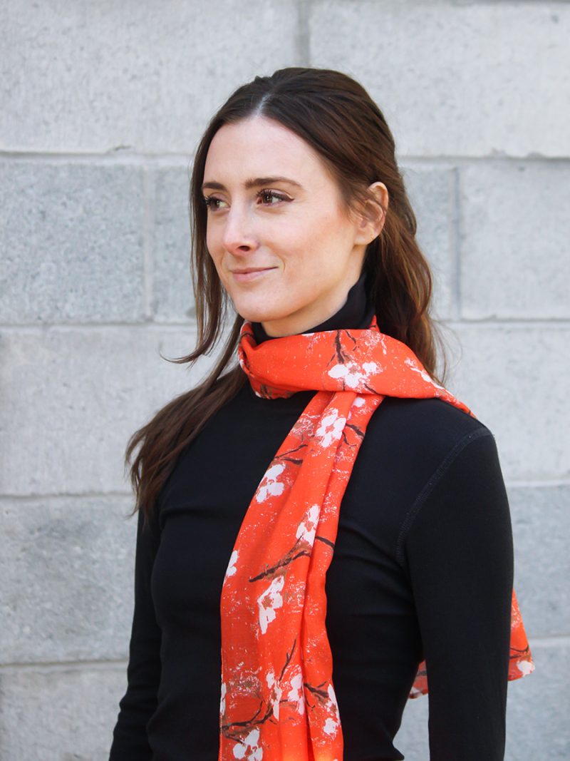 sustainable accent scarf in dogwood clementine